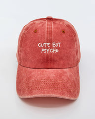 front view of Cute But Psycho Orange Washed Cap