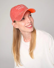 woman wearing Cute But Psycho Orange Washed Cap