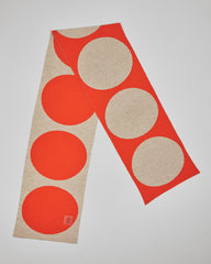 Orange & Cream Dots unisex acrylic scarf flat lay in vivid orange and soft cream
