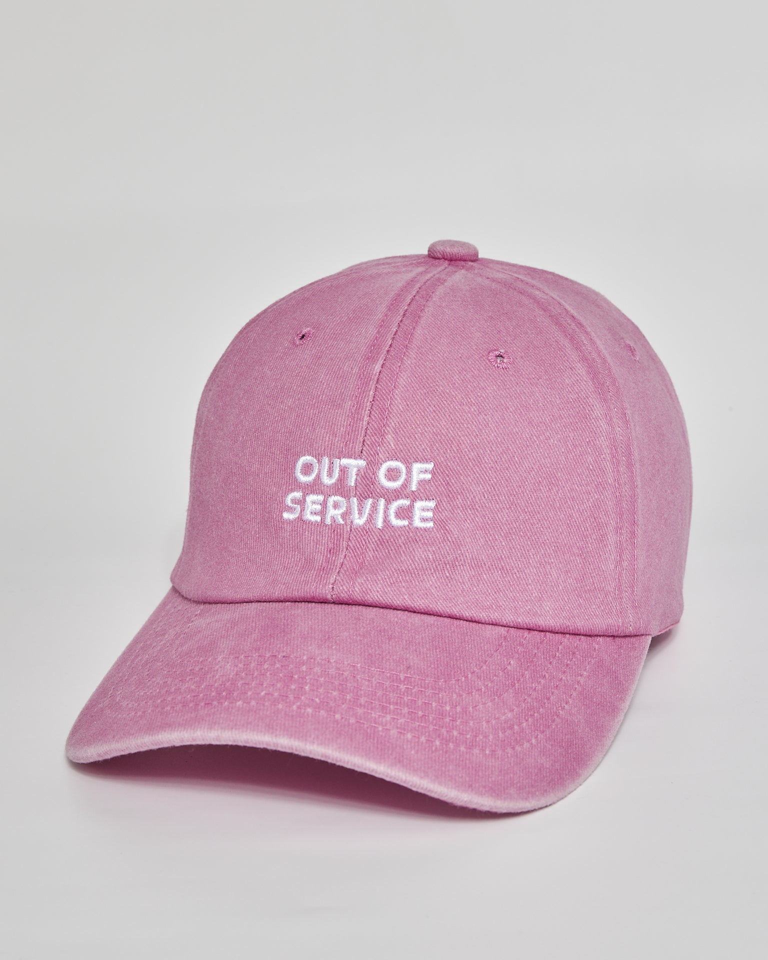 Out of Service pink washed cap - side view
