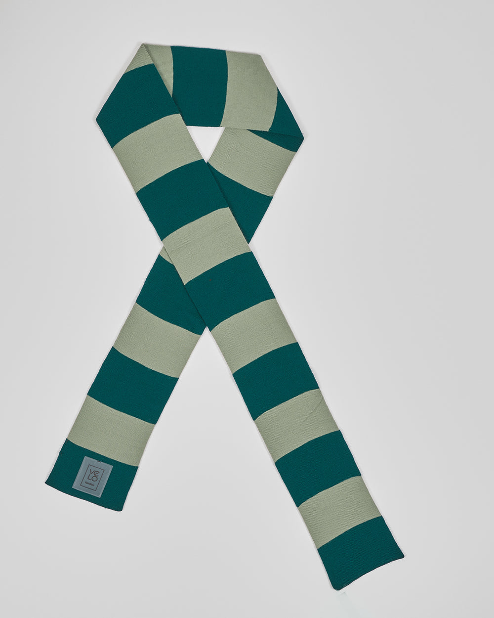 Pine & Sage unisex acrylic scarf flat lay in deep pine green and muted sage