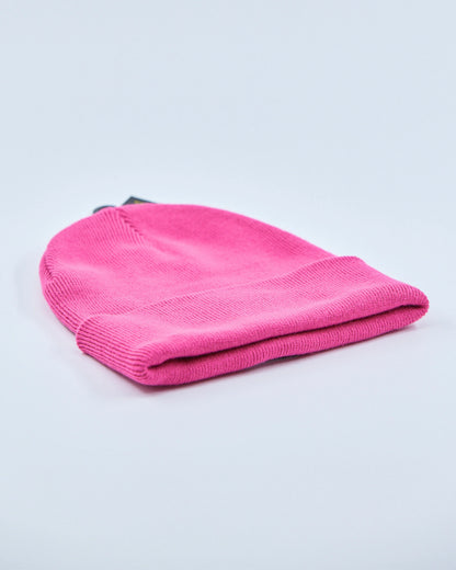 Pink beanie on a light gray background