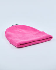 Pink beanie on a light gray background