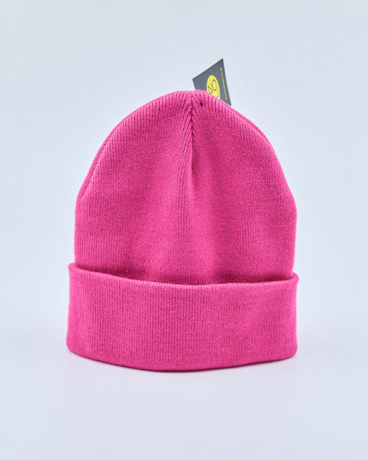 Pink beanie with a brand tag on a light gray background