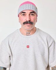 front view of a man wearing Crochet Pattern Cream Fisherman Beanie