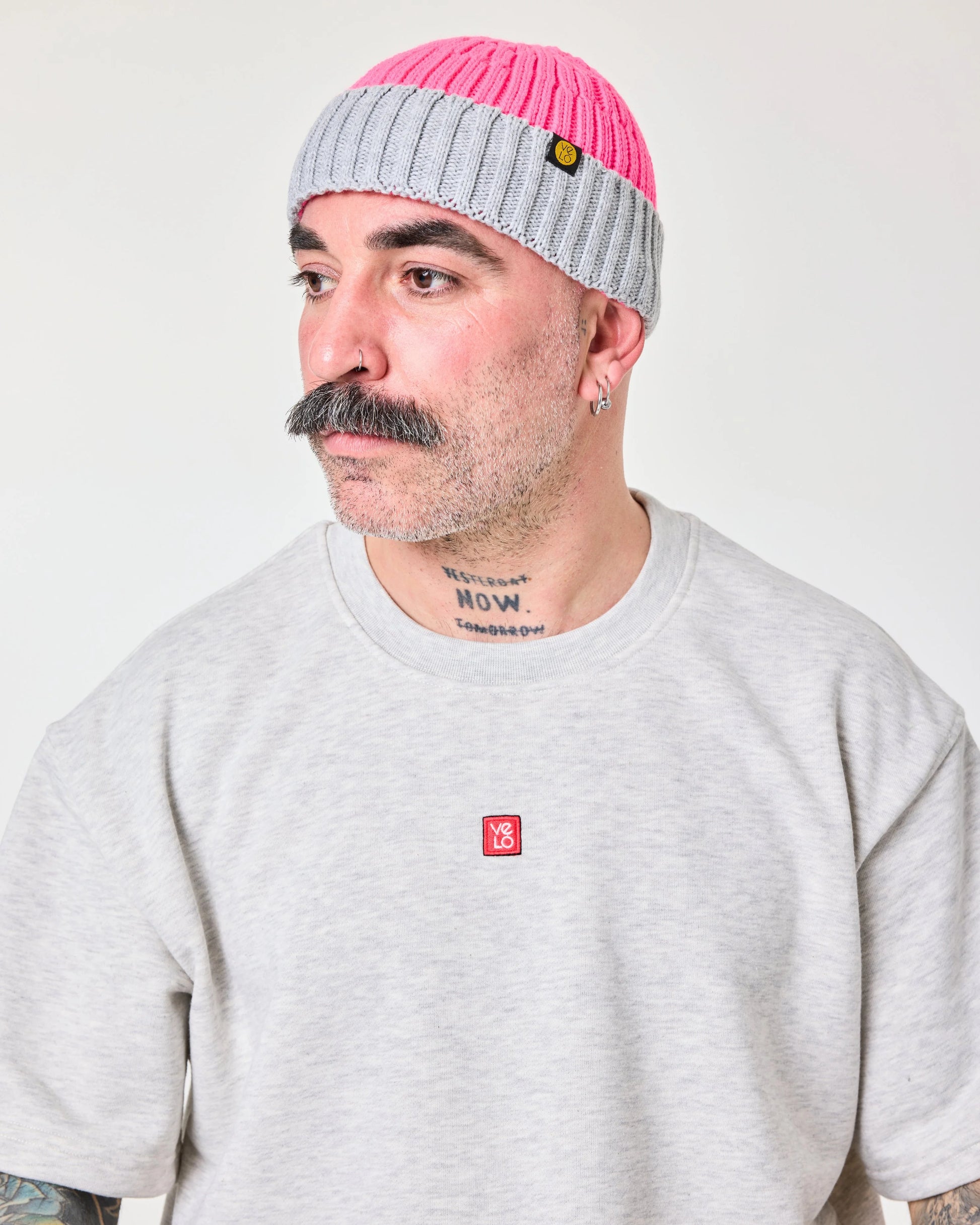 side view of a man wearing Crochet Pattern Cream Fisherman Beanie
