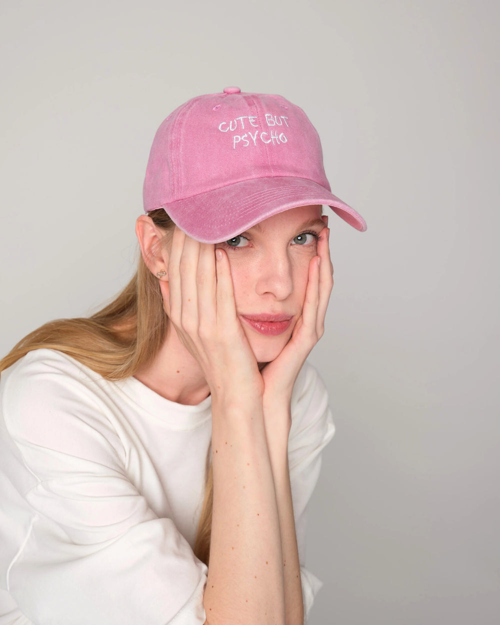 women wearing Pink Cute But Psycho Washed Cap