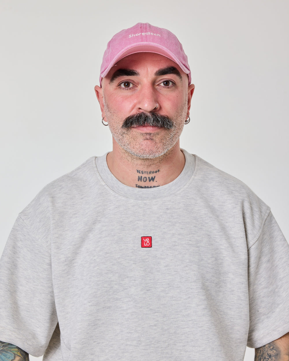 front view of a man wearing Shoreditch Pink Washed Cap