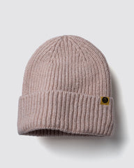 Powder Pink Lux Beanie on a light gray background