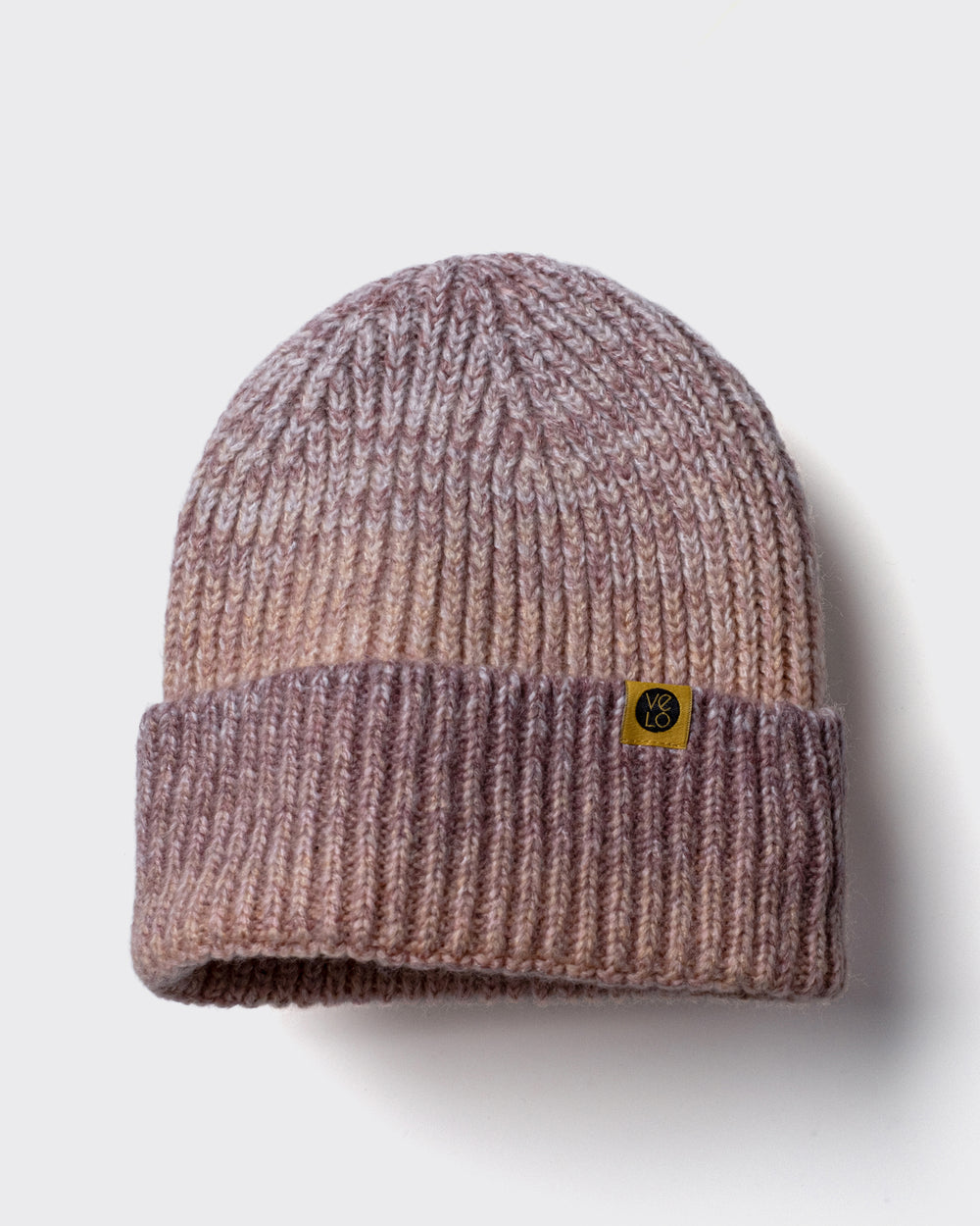 Powder Pink Mix Lux Beanie on a light gray background