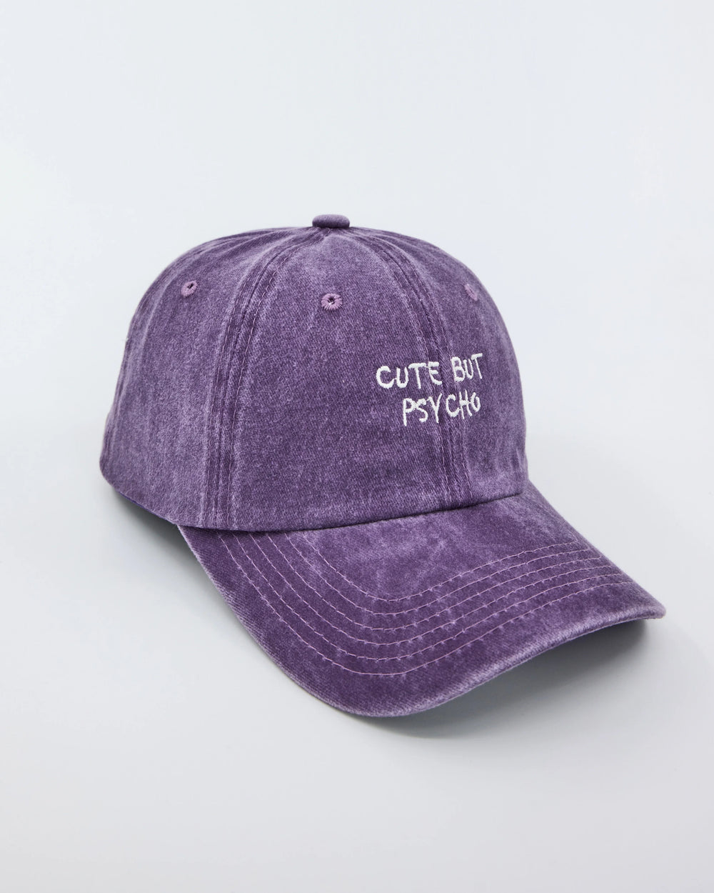 side view of Cute But Psycho Purple Washed Cap