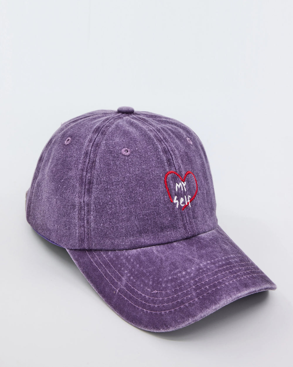 side view of Purple Love Myself Washed Cap