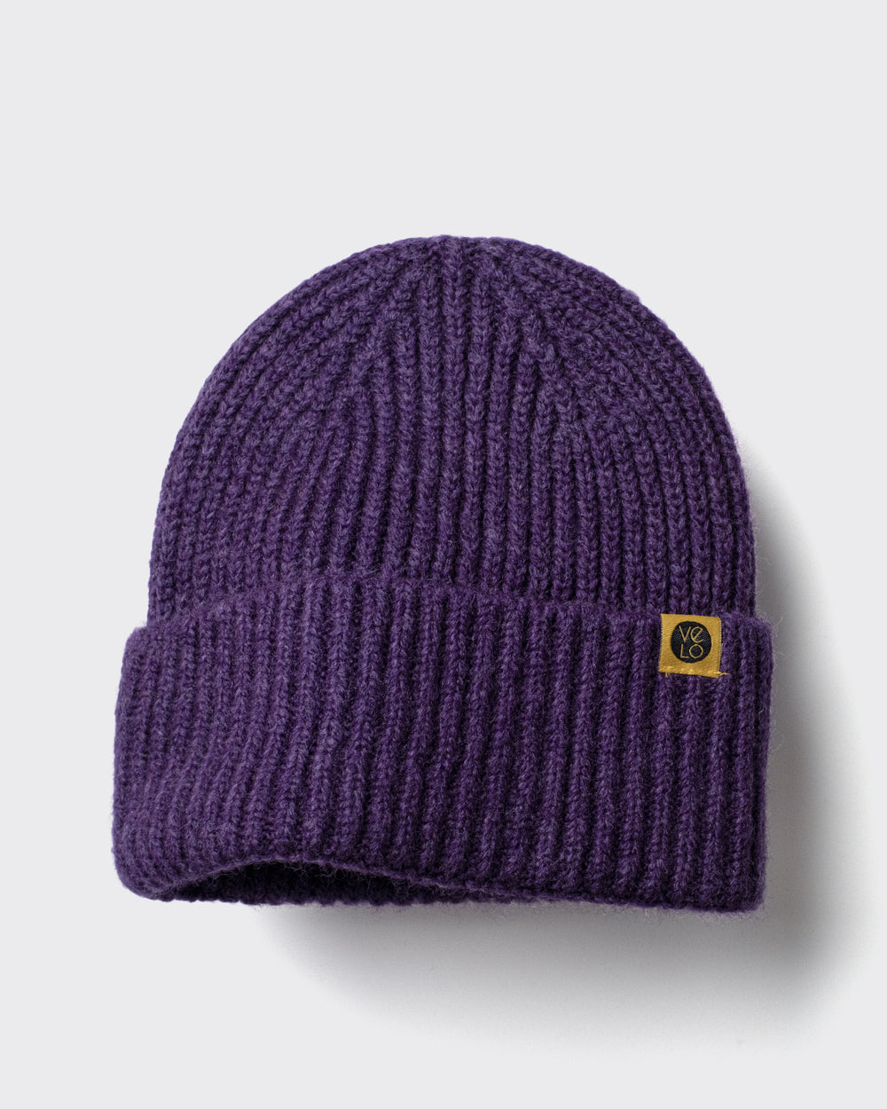 Purple Lux Beanie on a light gray background