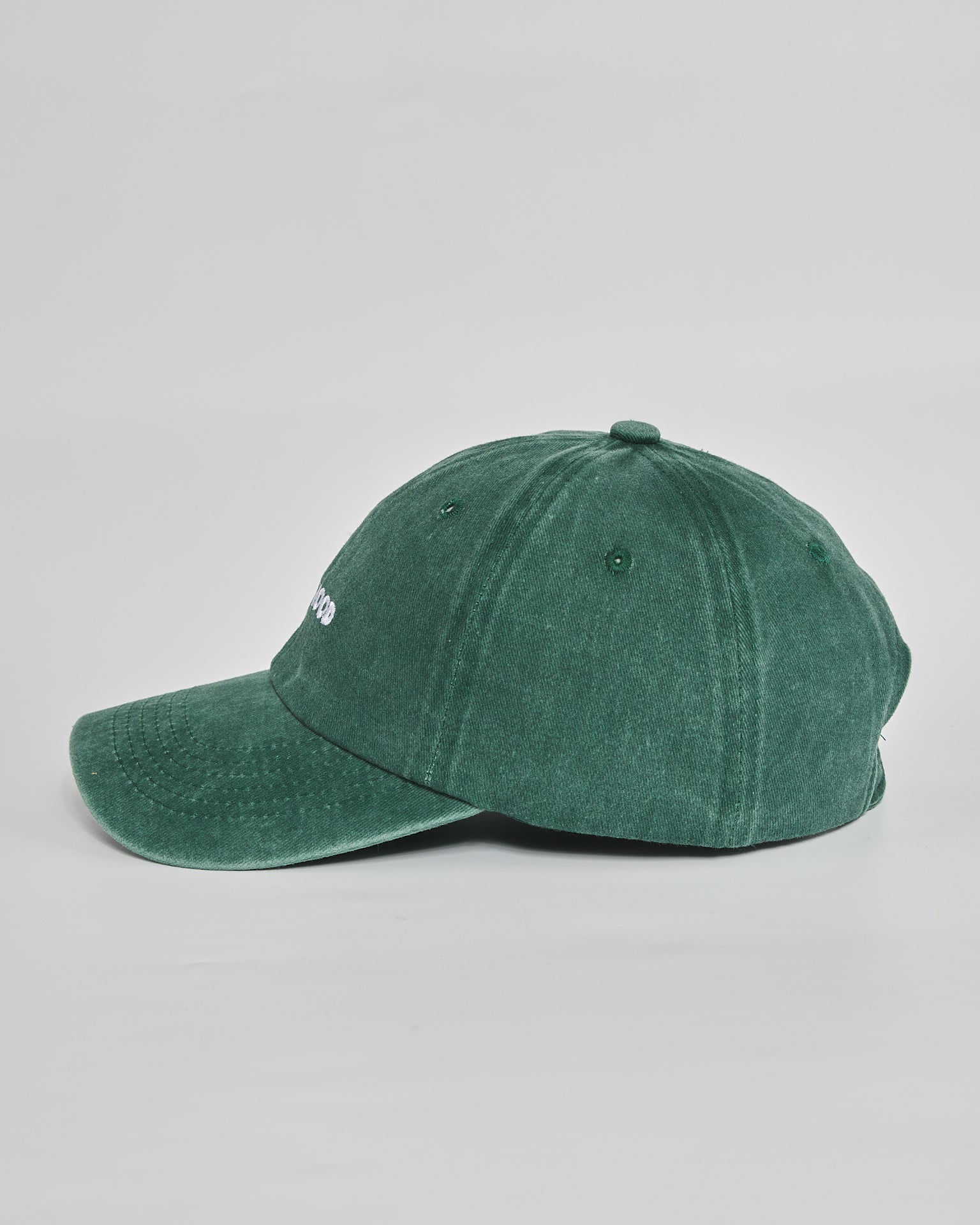 Quiet Mood forest green washed cap - angled view