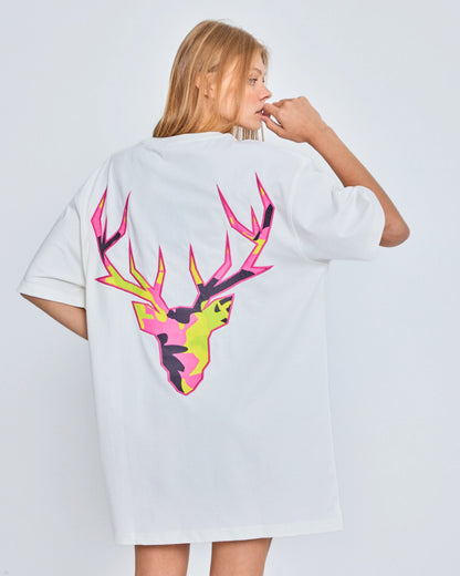 Person wearing a white t-shirt with a colorful deer graphic on the back against a plain background