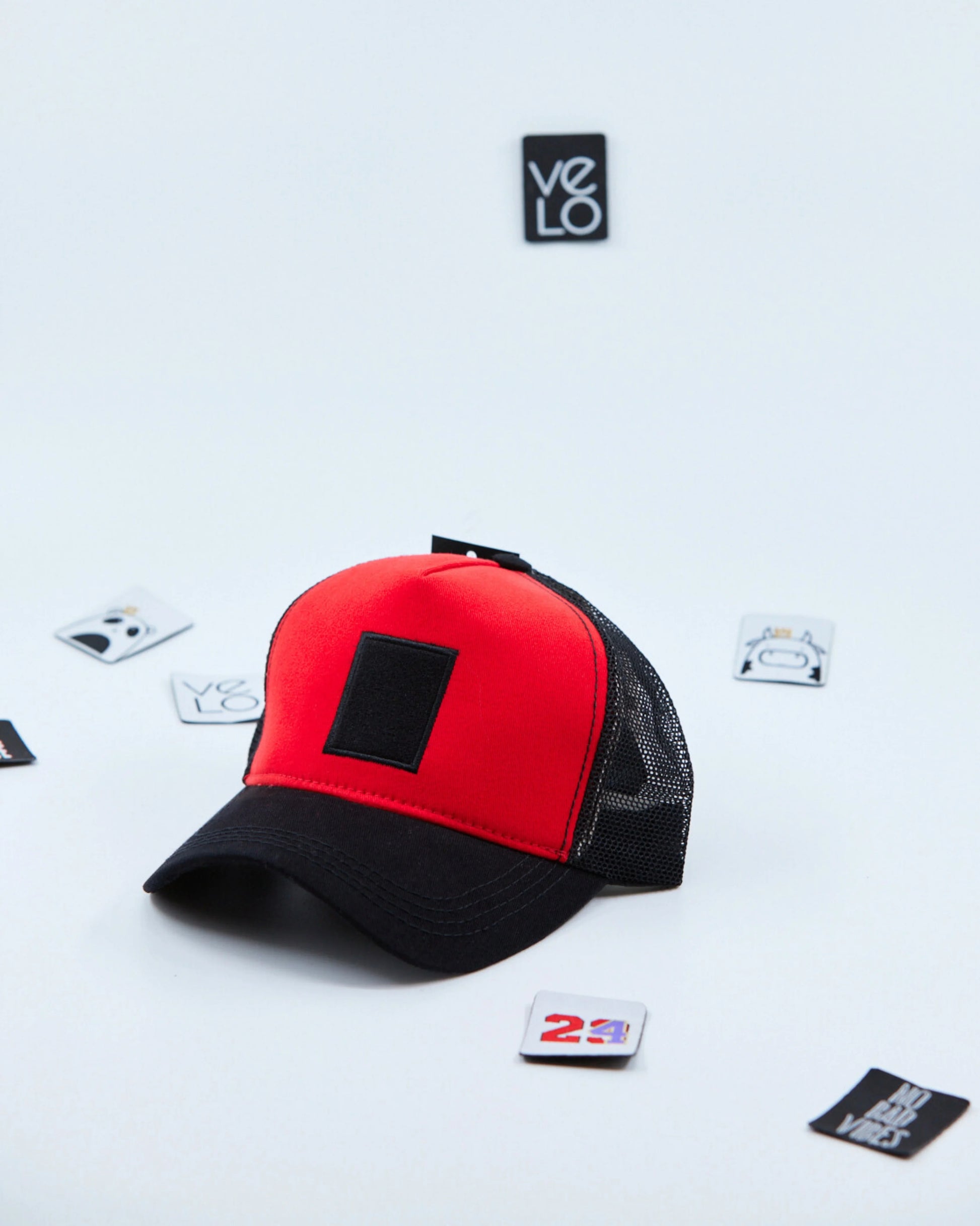 Side view of Red and Black Customisable Trucker Cap