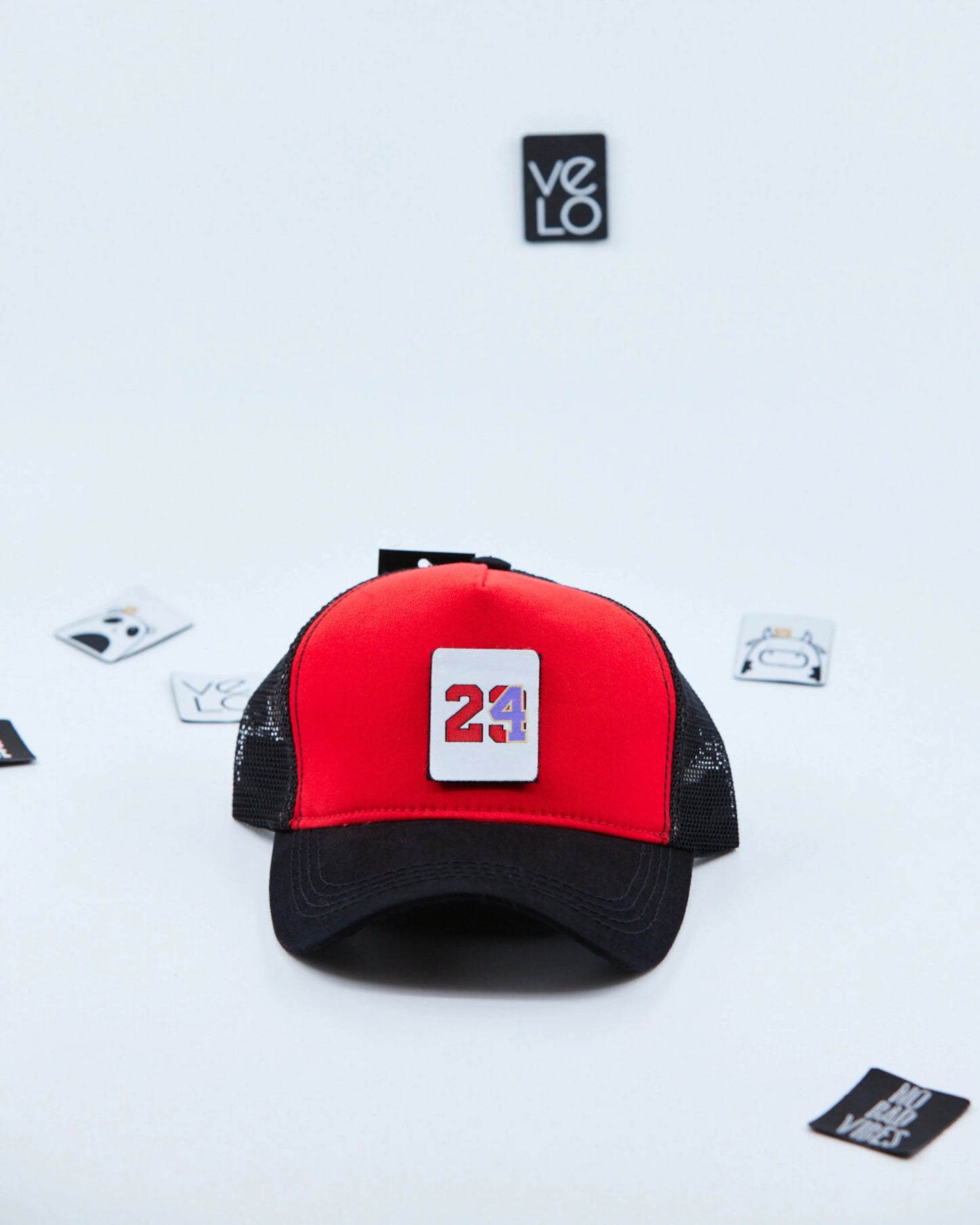 Front view of Red and Black Customisable Trucker Cap