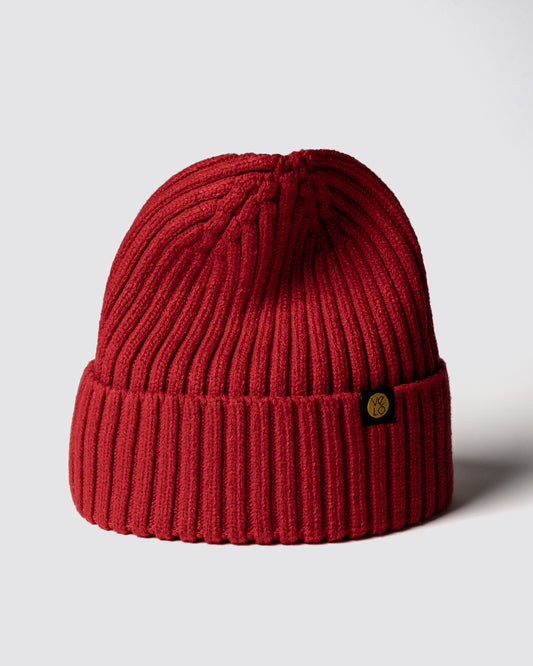 Red Classic Beanie with a brand logo on a light gray background