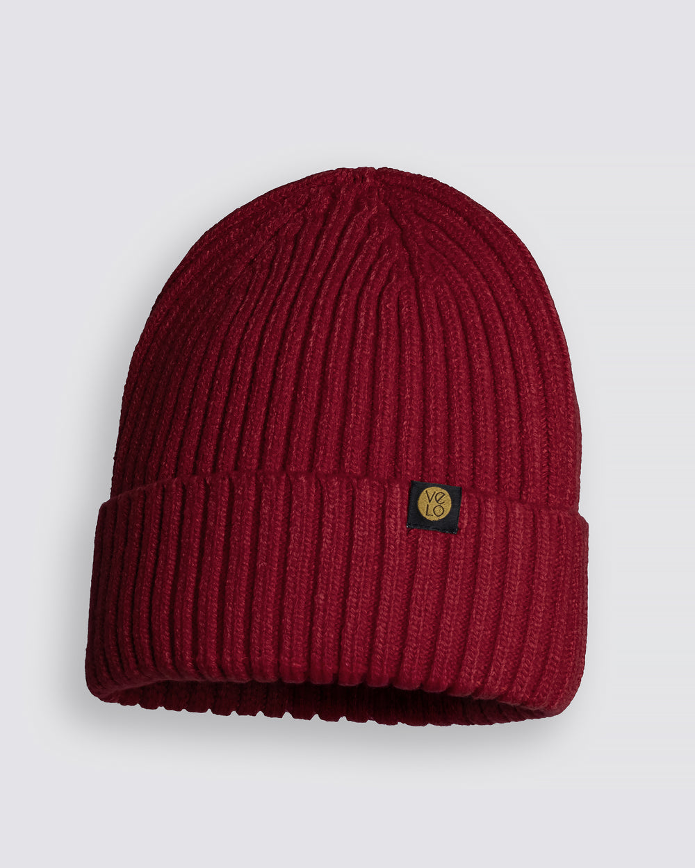 Red Classic Beanie with a logo on a light gray background