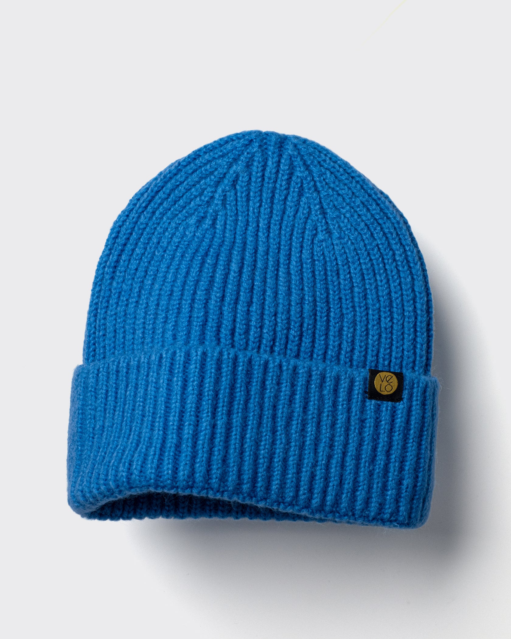 Royal Blue Lux Beanie on a light gray background