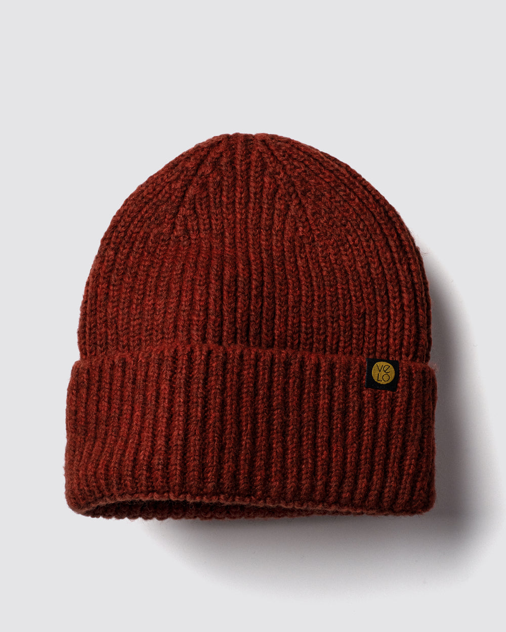Rust Brown Lux Beanie on a light gray background