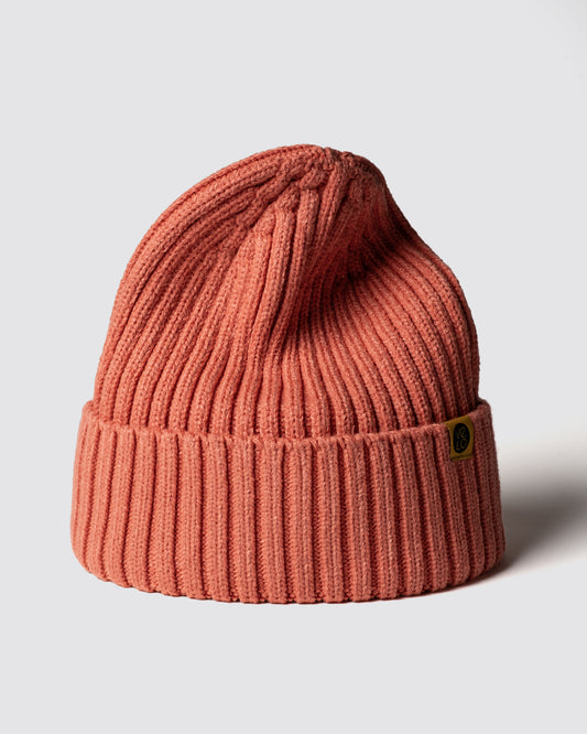 Salmon Classic Beanie with a brand logo on a light gray background