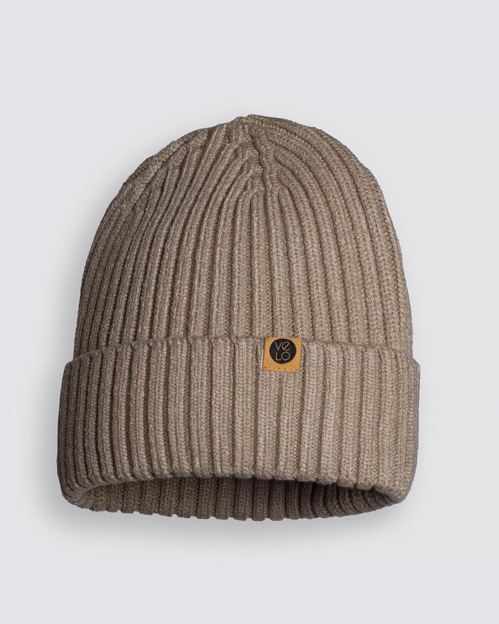 Sand Beige Classic Beanie with a brand logo on a light gray background