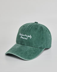 Selectively Social forest green washed cap - side view