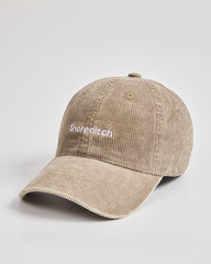 Beige cap with 'Shoreditch' embroidery on a light gray background