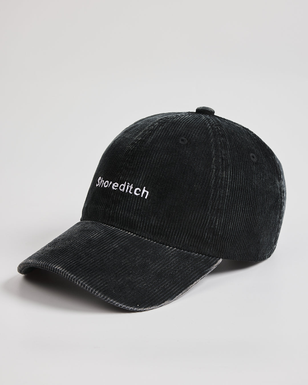 Black cap with brand logo on a white background