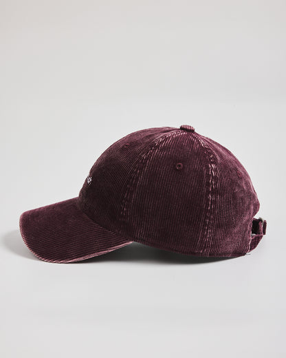 Maroon baseball cap on a light gray background
