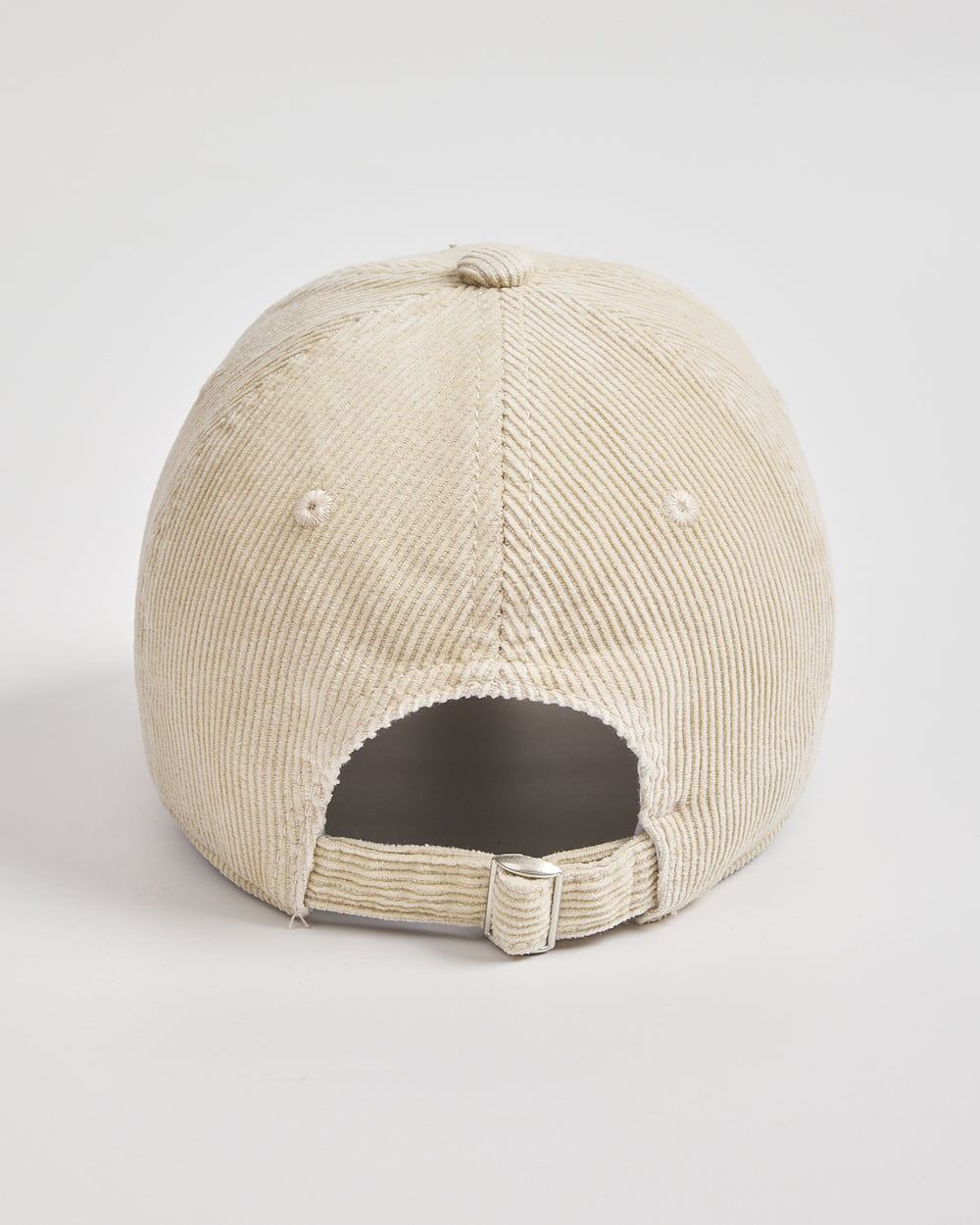 Cream cap on a light gray background