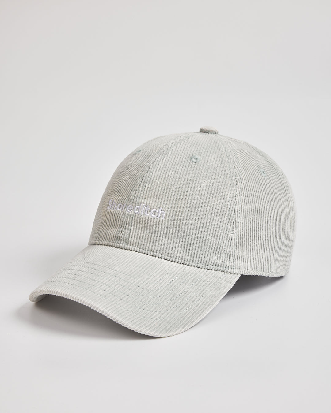 Gray cap with a brand logo on a light gray background