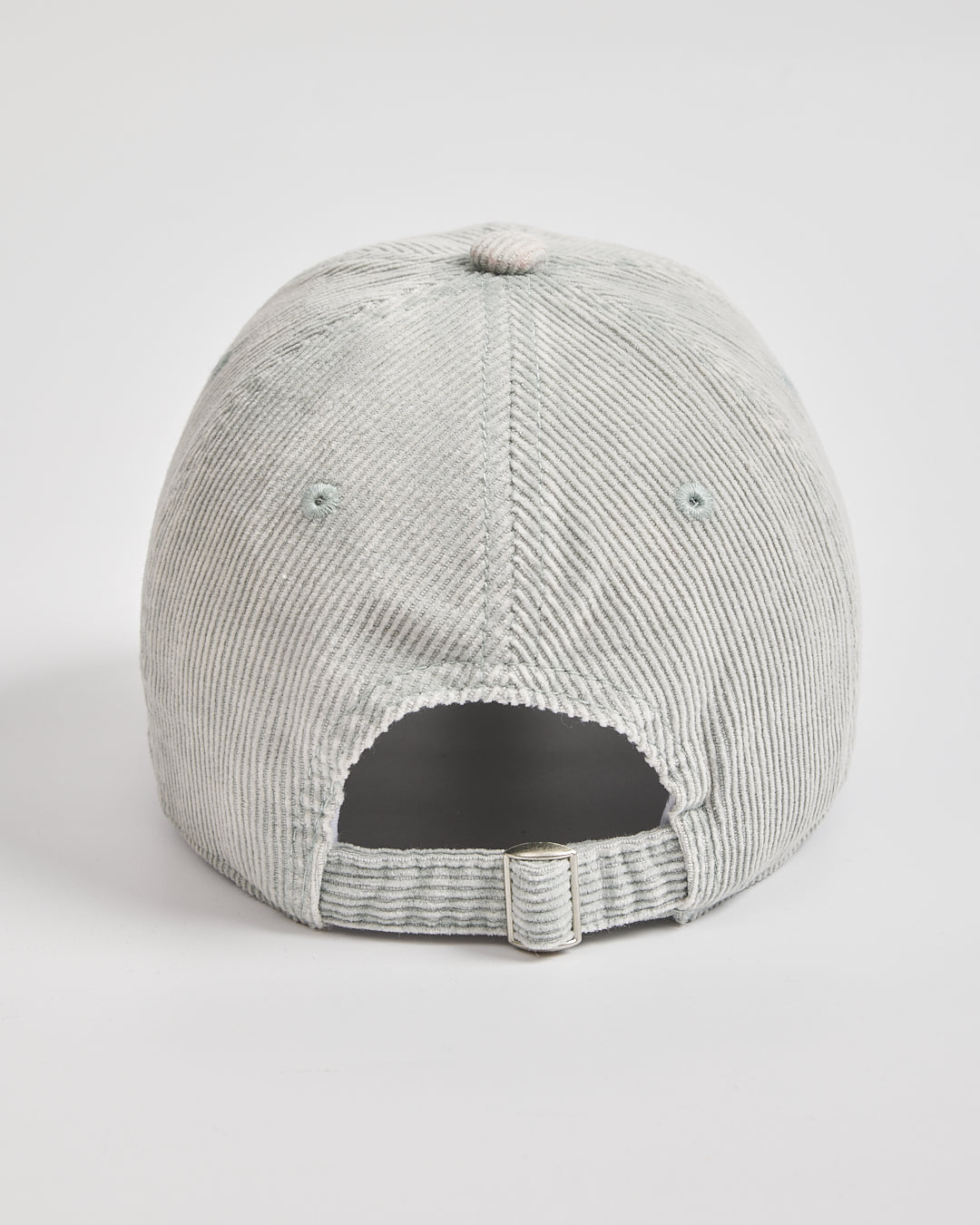 Gray corduroy cap on a light gray background
