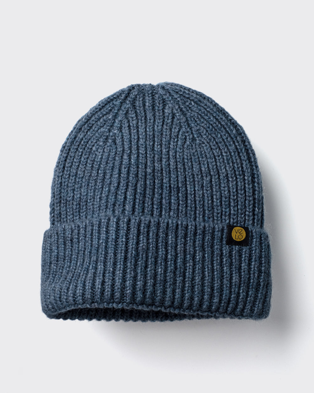 Slate Blue Lux Beanie on a light gray background