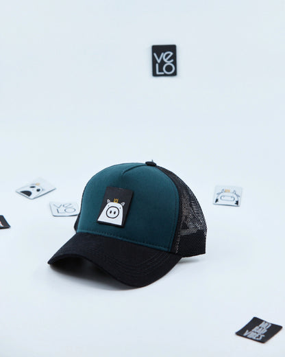 Side view of Teal Green and Black Customisable Trucker Cap with patches