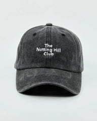Front view of The Notting Hill Club Black Washed Cap