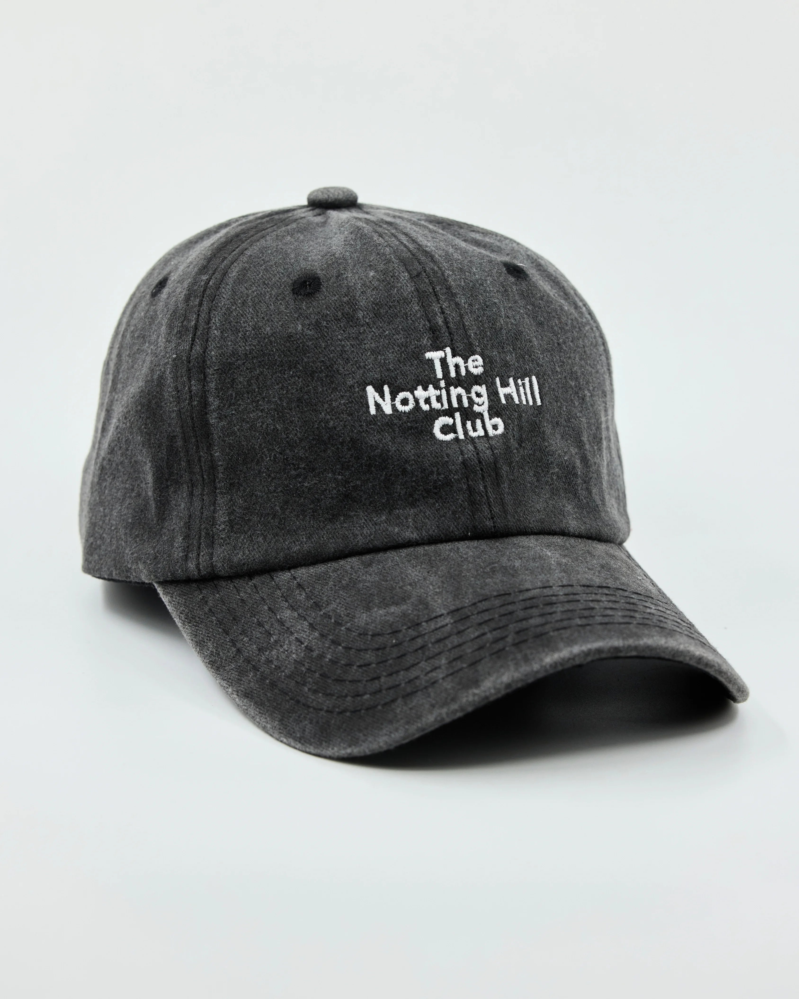Side view of The Notting Hill Club Black Washed Cap