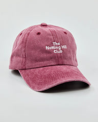 side view of The Notting Hill Club Burgundy Washed Cap