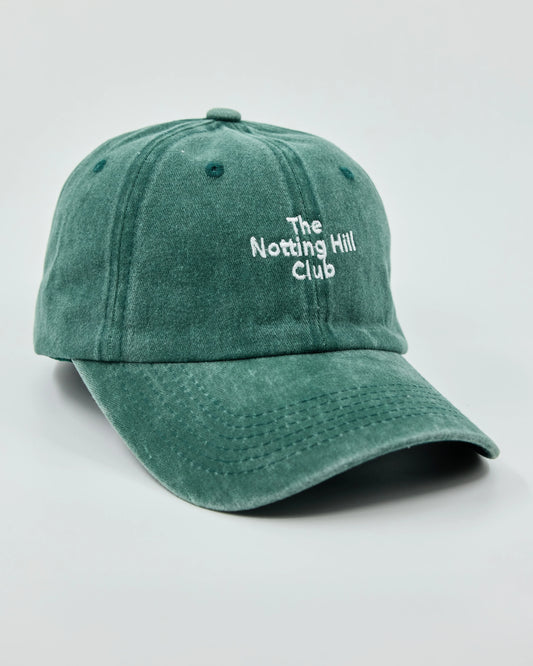 Front view of The Notting Hill Club Dark Green Washed Cap