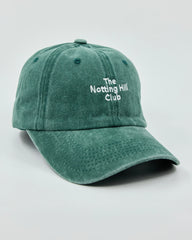 Front view of The Notting Hill Club Dark Green Washed Cap