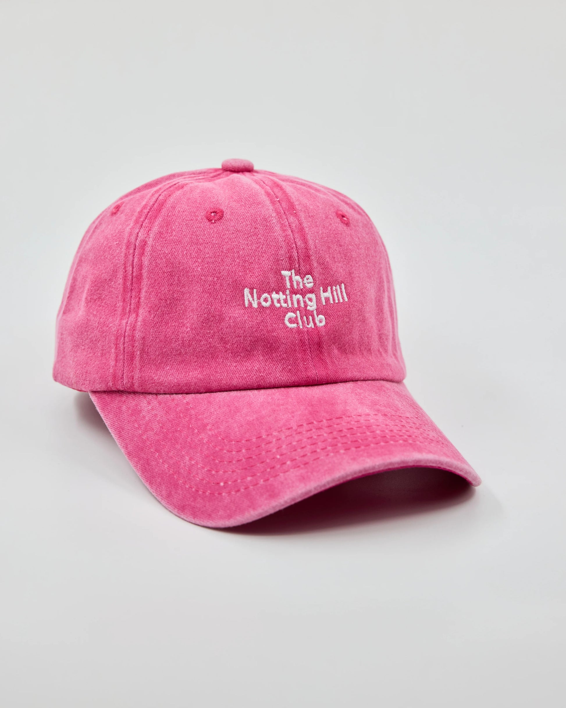 Side view of The Notting Hill Club Hot Pink Washed Cap