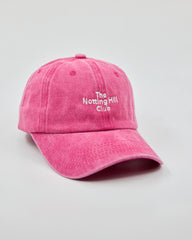 Side view of The Notting Hill Club Hot Pink Washed Cap