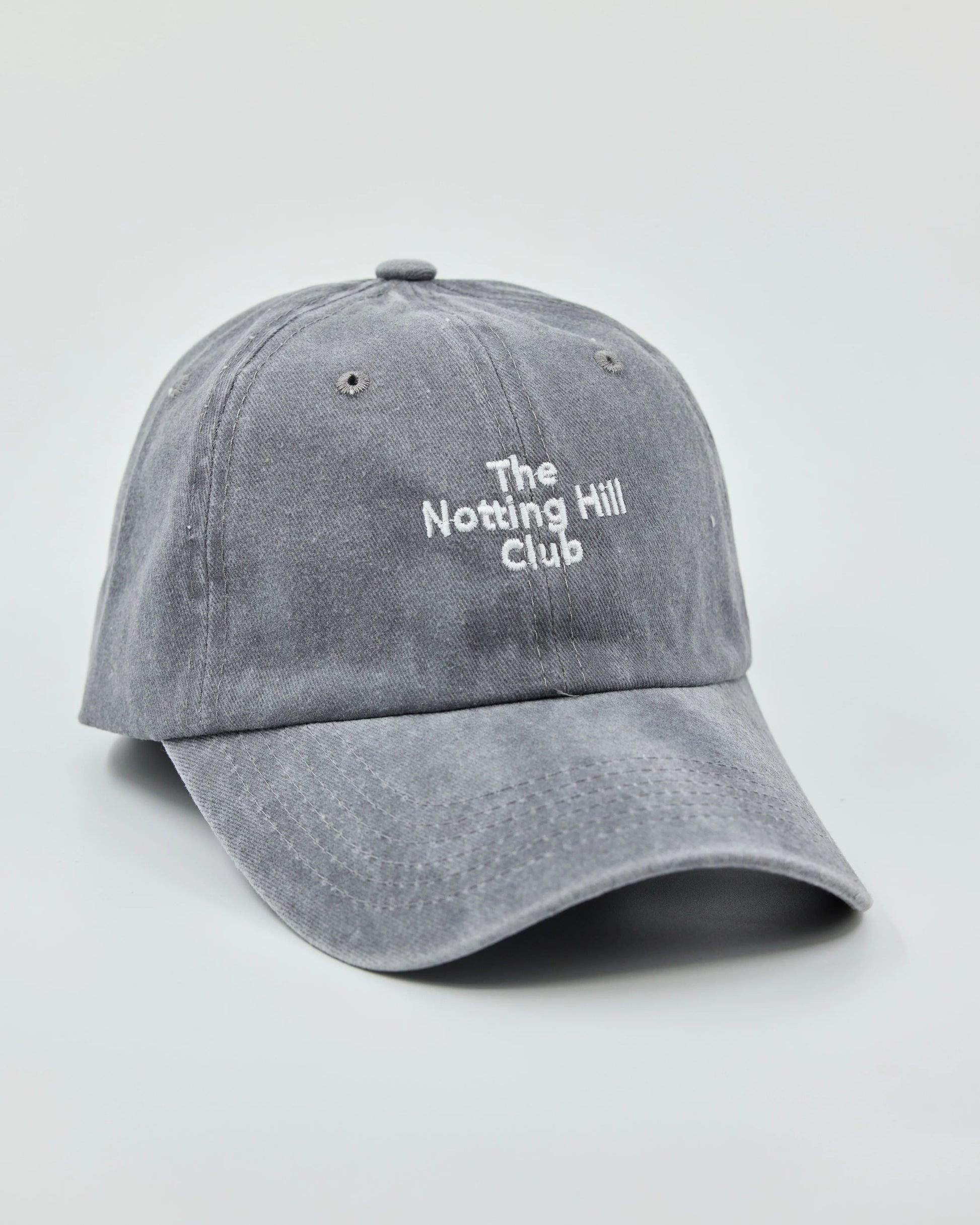 Side view of The Notting Hill Club Light Gray Washed Cap