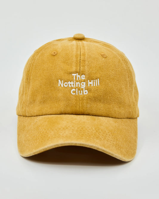 Front view of The Notting Hill Club Mustard Washed Cap