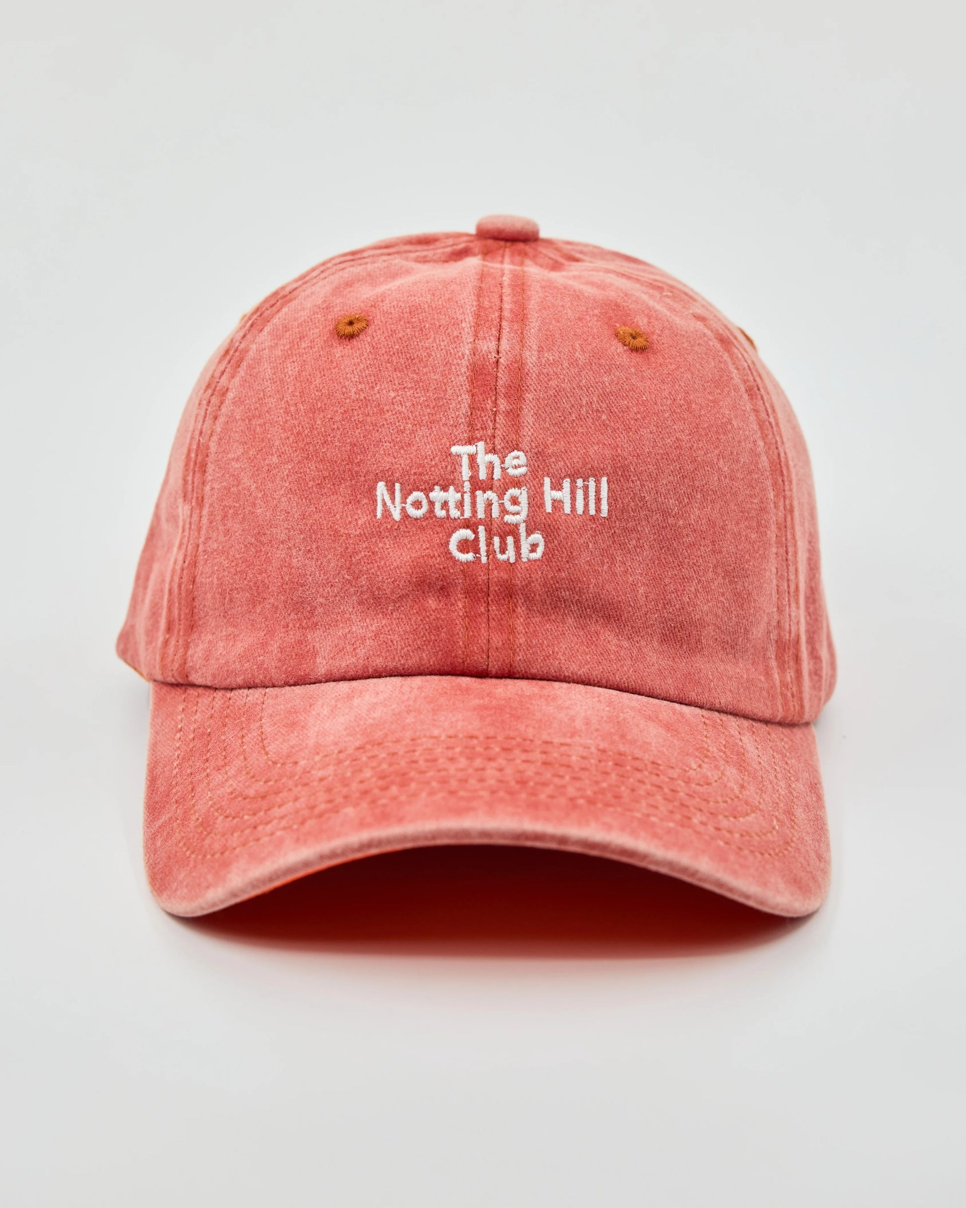 front view of The Notting Hill Club Orange Washed Cap