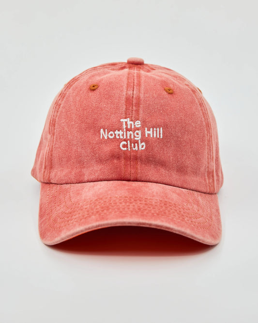 front view of The Notting Hill Club Orange Washed Cap