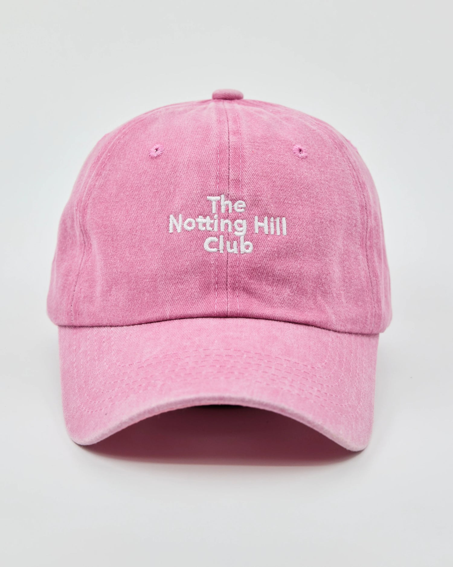 front view of The Notting Hill Club Light Pink Washed Cap
