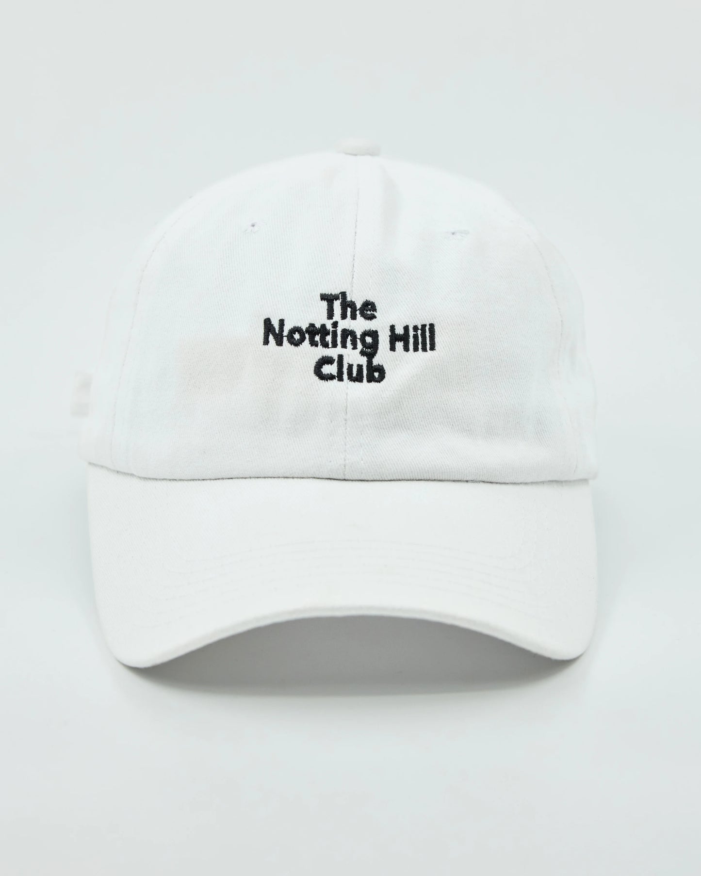 Front view of The Notting Hill Club White Washed Cap