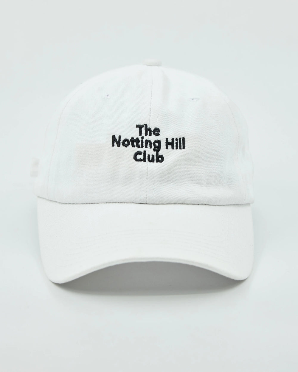 Front view of The Notting Hill Club White Washed Cap